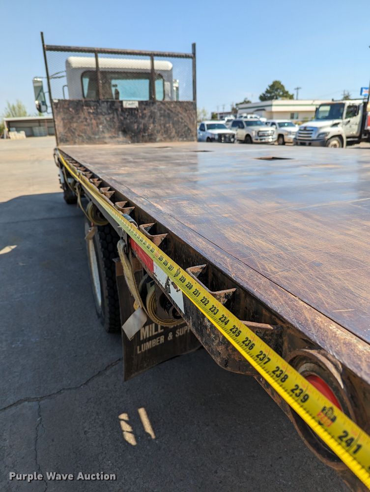 image for item MN9874 2014 Peterbilt 330  dump flatbed truck