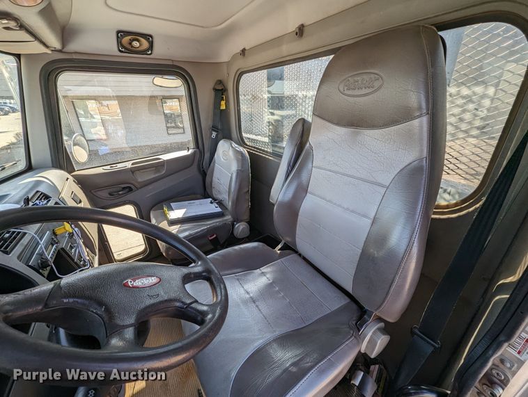 image for item MN9874 2014 Peterbilt 330  dump flatbed truck