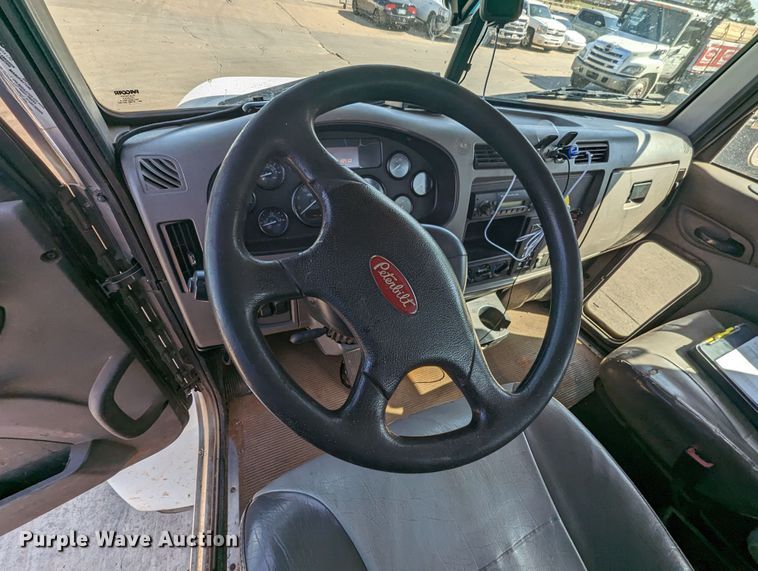 image for item MN9874 2014 Peterbilt 330  dump flatbed truck