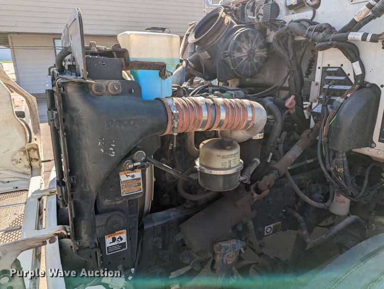 image for item MN9874 2014 Peterbilt 330  dump flatbed truck