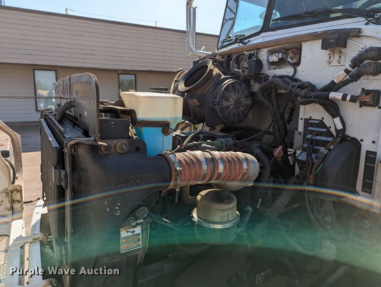 image for item MN9874 2014 Peterbilt 330  dump flatbed truck