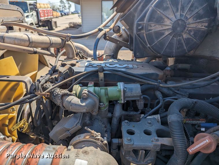 image for item MN9874 2014 Peterbilt 330  dump flatbed truck