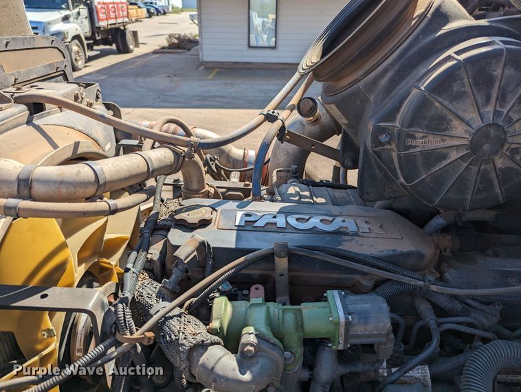 image for item MN9874 2014 Peterbilt 330  dump flatbed truck