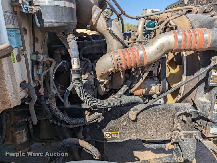 image for item MN9874 2014 Peterbilt 330  dump flatbed truck