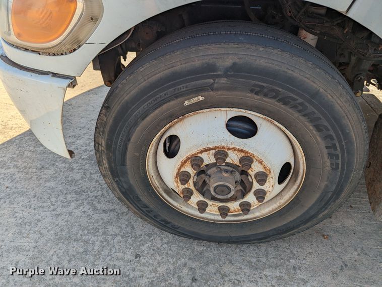 image for item MN9874 2014 Peterbilt 330  dump flatbed truck