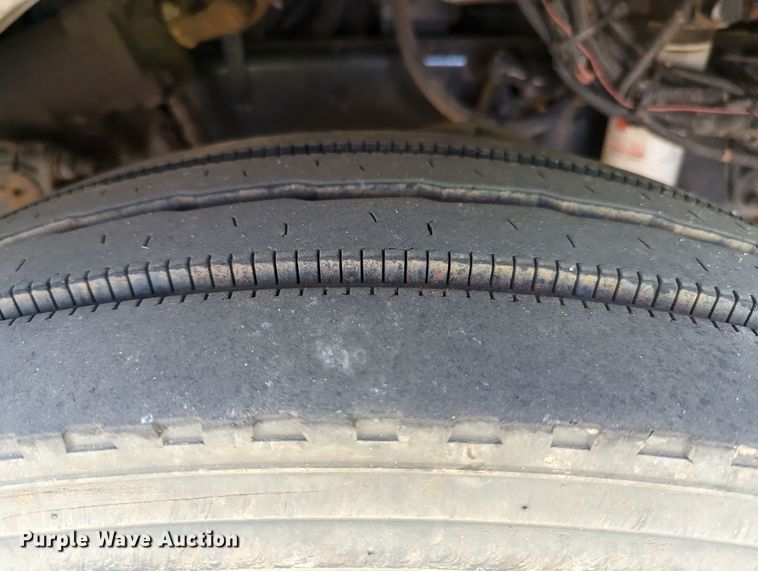 image for item MN9874 2014 Peterbilt 330  dump flatbed truck