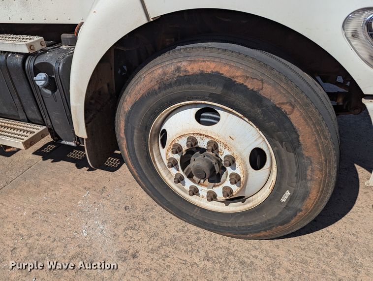 image for item MN9874 2014 Peterbilt 330  dump flatbed truck