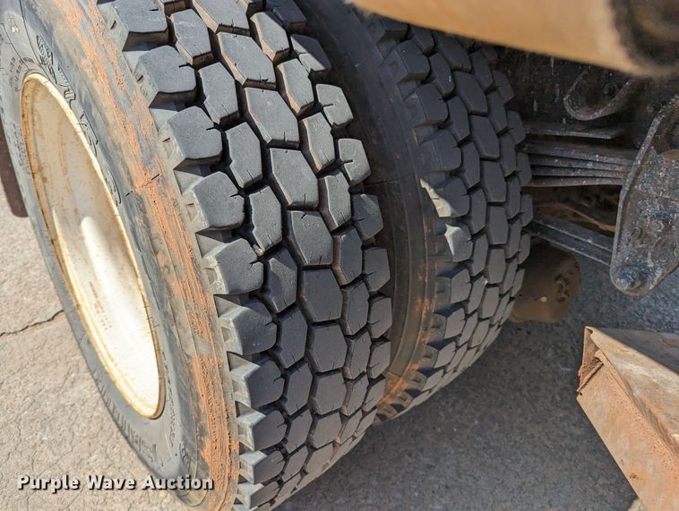 image for item MN9874 2014 Peterbilt 330  dump flatbed truck