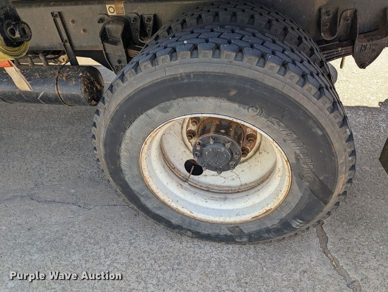 image for item MN9874 2014 Peterbilt 330  dump flatbed truck