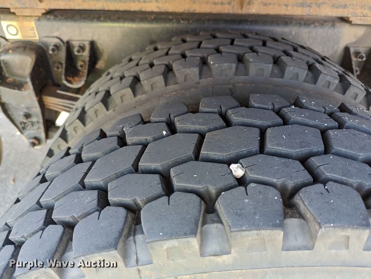 image for item MN9874 2014 Peterbilt 330  dump flatbed truck