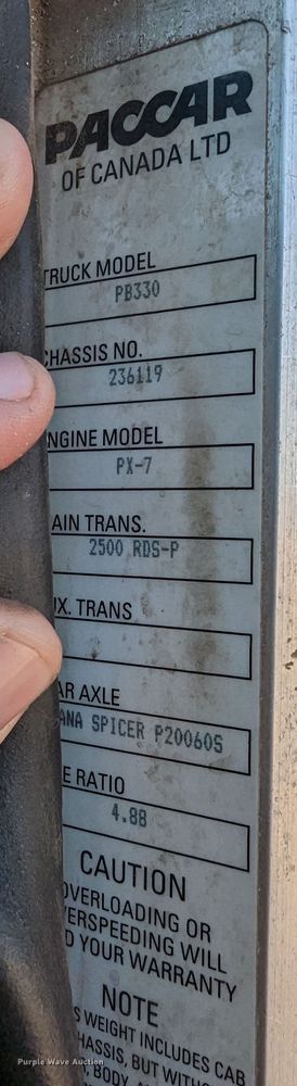 image for item MN9874 2014 Peterbilt 330  dump flatbed truck