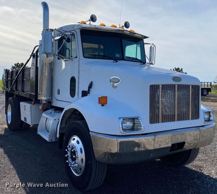 image for item KB9496 1999 Peterbilt 330  dump flatbed truck