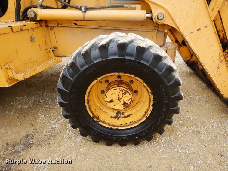 image for item KU9872 2000 John Deere 410E  backhoe