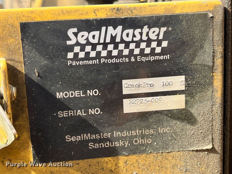 image for item LA9885 2011 SealMaster Crack Pro 100 Skid  crack sealer with 2011 Heartland trailer