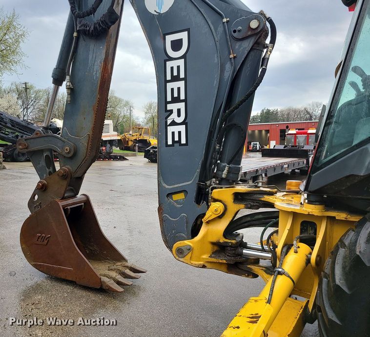 image for item MX9619 2010 John Deere 710J  backhoe