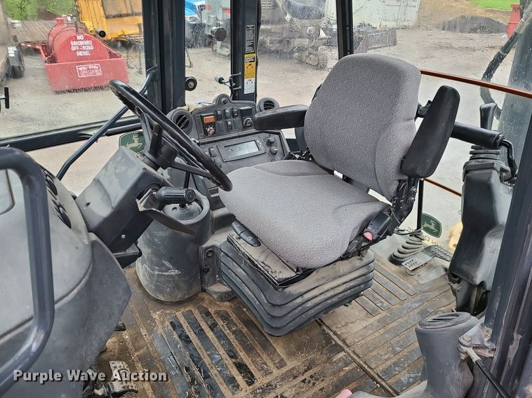 image for item MX9619 2010 John Deere 710J  backhoe