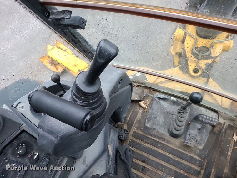 image for item MX9619 2010 John Deere 710J  backhoe