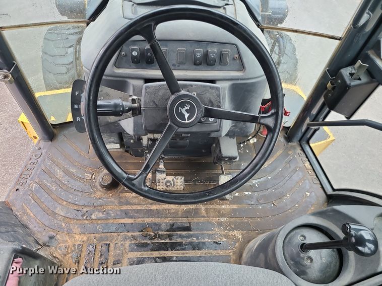 image for item MX9619 2010 John Deere 710J  backhoe