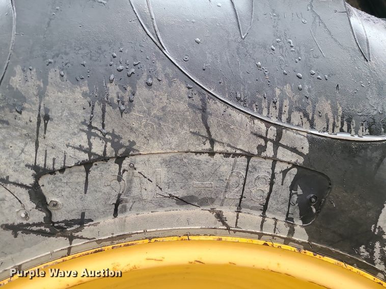 image for item MX9619 2010 John Deere 710J  backhoe