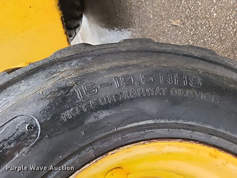 image for item MX9619 2010 John Deere 710J  backhoe