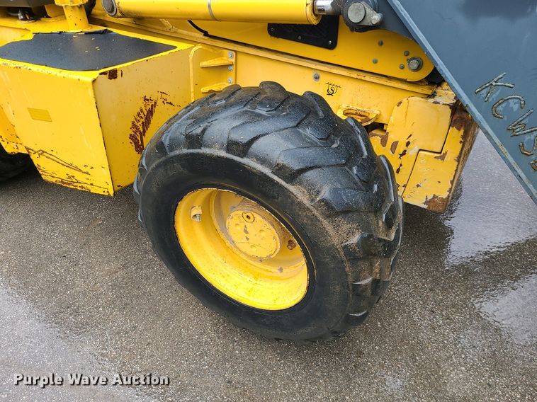 image for item MX9619 2010 John Deere 710J  backhoe