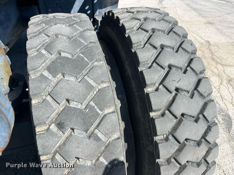 image for item LA9871 2007 John Deere 210CW  wheeled excavator