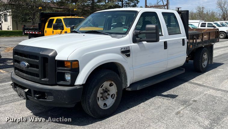 image for item LA9875 2008 Ford F250 Super Duty XL  Crew Cab flatbed pickup truck