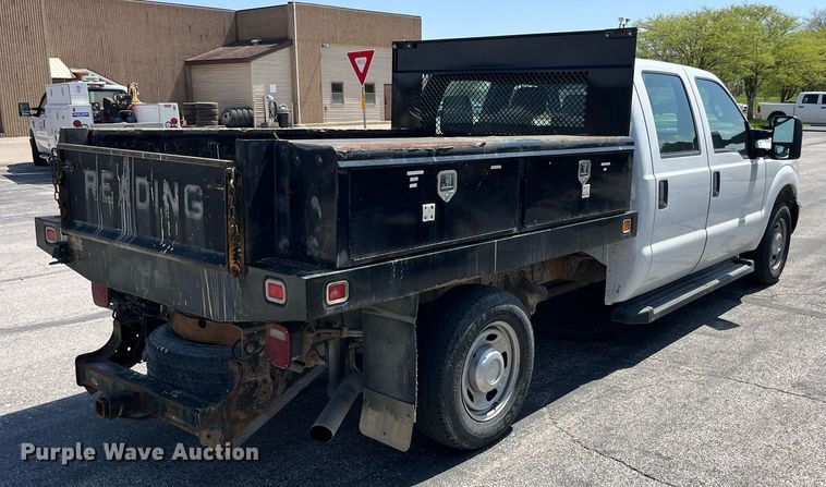 image for item LA9880 2011 Ford F250 Super Duty  Crew Cab flatbed pickup truck