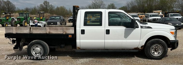image for item LA9899 2011 Ford F250 Super Duty  Crew Cab flatbed pickup truck