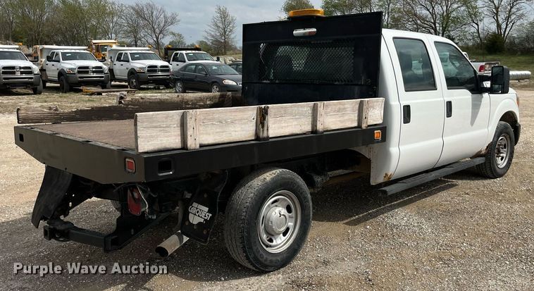 image for item LA9899 2011 Ford F250 Super Duty  Crew Cab flatbed pickup truck