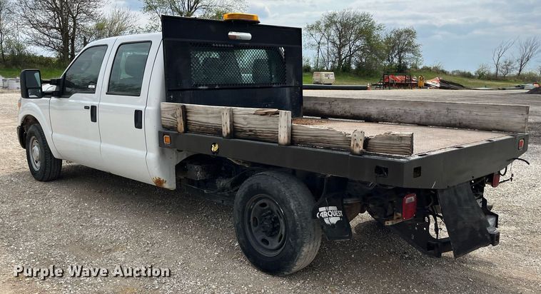 image for item LA9899 2011 Ford F250 Super Duty  Crew Cab flatbed pickup truck