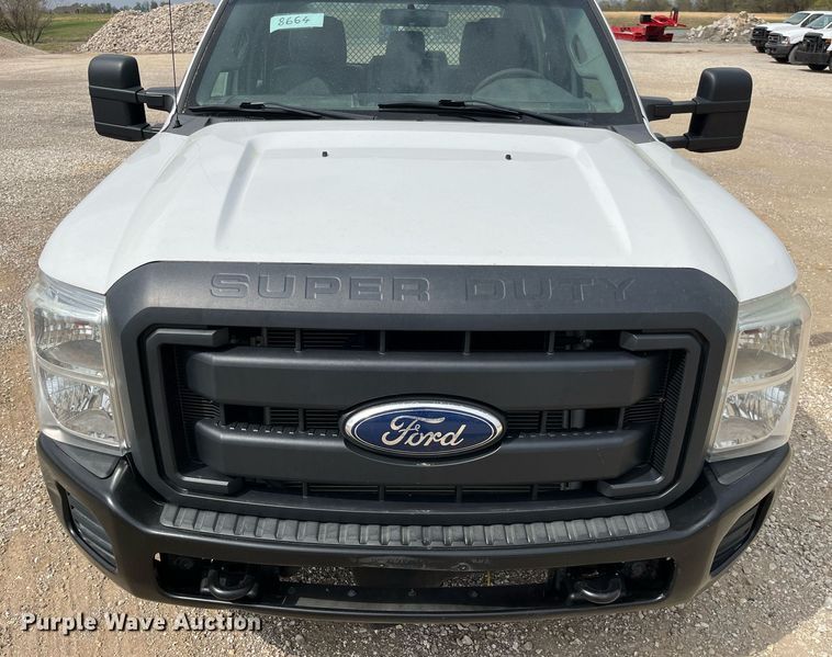 image for item LA9899 2011 Ford F250 Super Duty  Crew Cab flatbed pickup truck