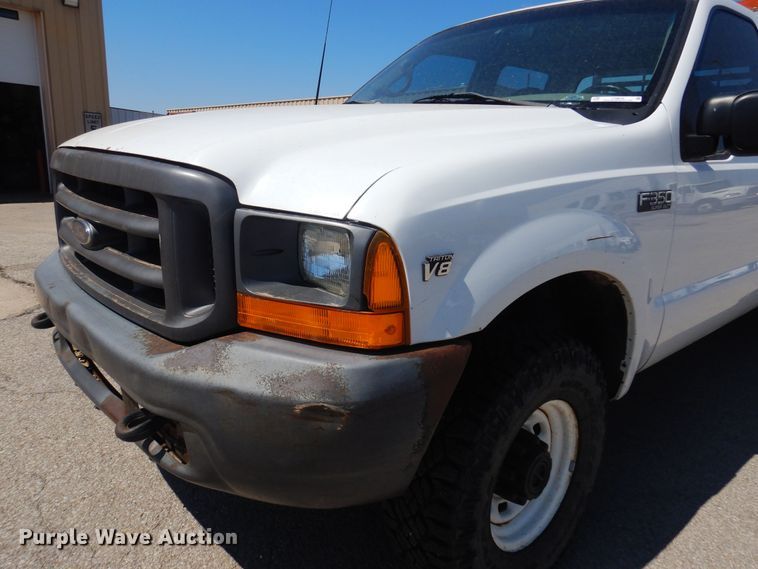 image for item LT9616 2000  Ford F350 Super Duty  Crew Cab flatbed pickup truck