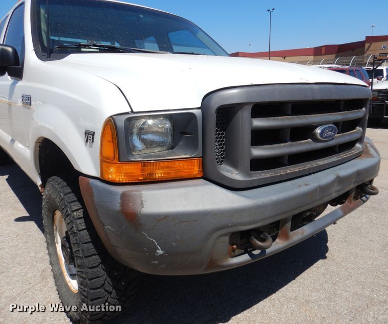 image for item LT9616 2000  Ford F350 Super Duty  Crew Cab flatbed pickup truck