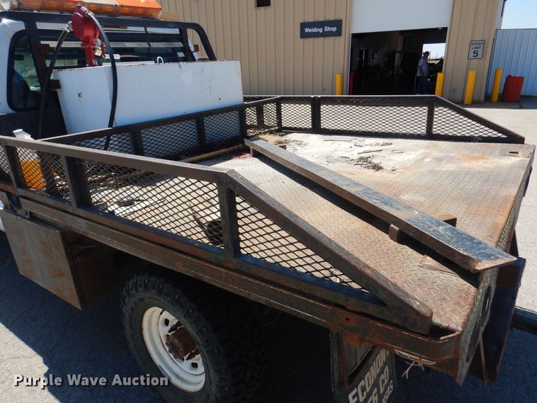 image for item LT9616 2000  Ford F350 Super Duty  Crew Cab flatbed pickup truck