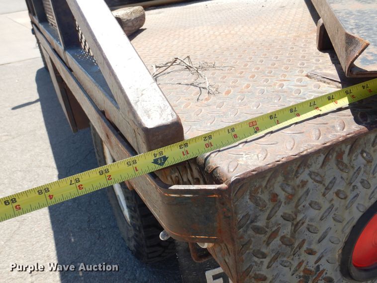 image for item LT9616 2000  Ford F350 Super Duty  Crew Cab flatbed pickup truck