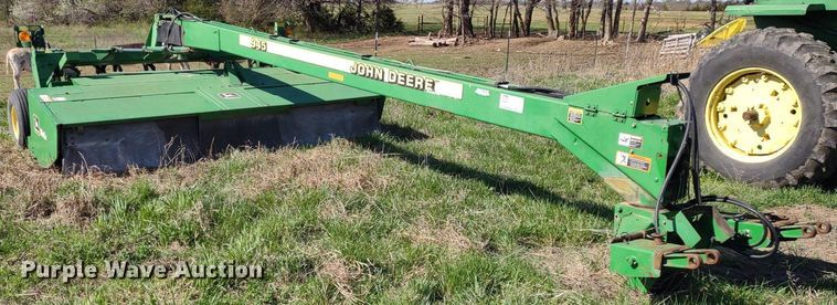 image for item DQ1672 2000 John Deere 945  swather / windrower