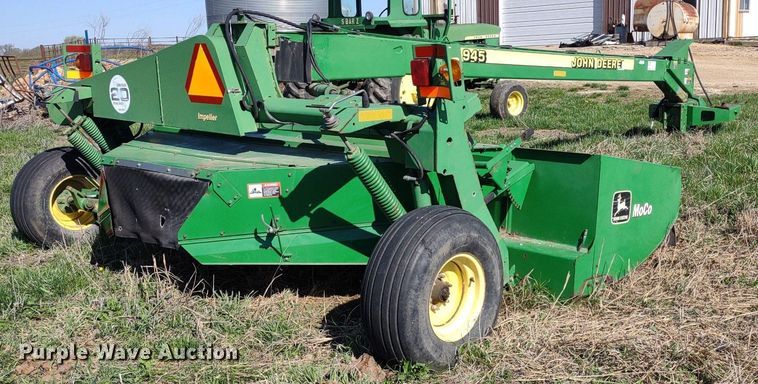 image for item DQ1672 2000 John Deere 945  swather / windrower