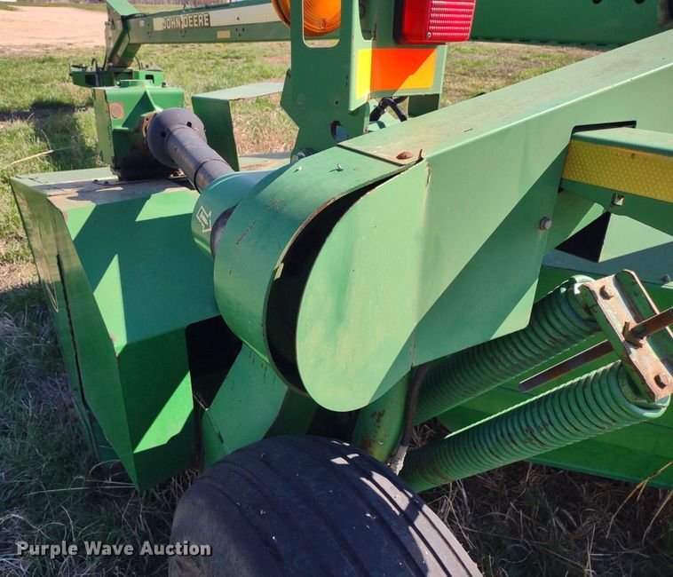 image for item DQ1672 2000 John Deere 945  swather / windrower