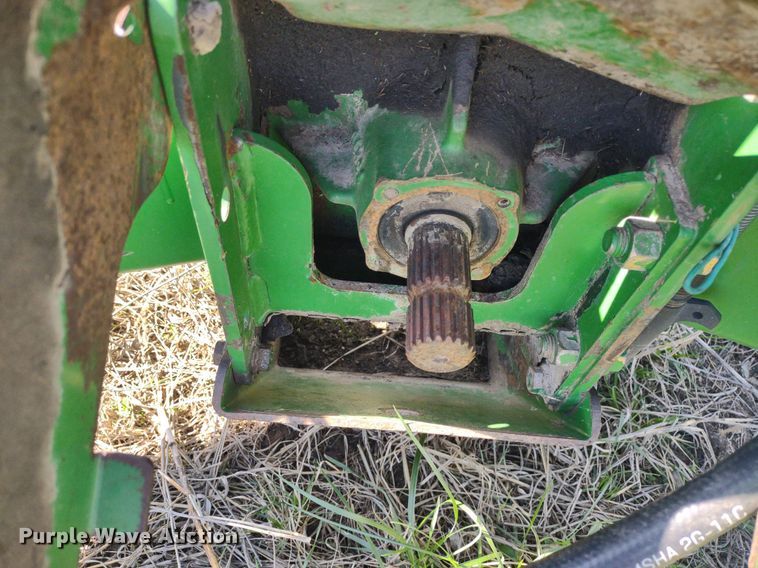 image for item DQ1672 2000 John Deere 945  swather / windrower