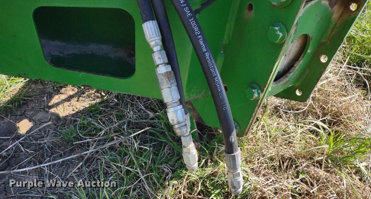 image for item DQ1672 2000 John Deere 945  swather / windrower