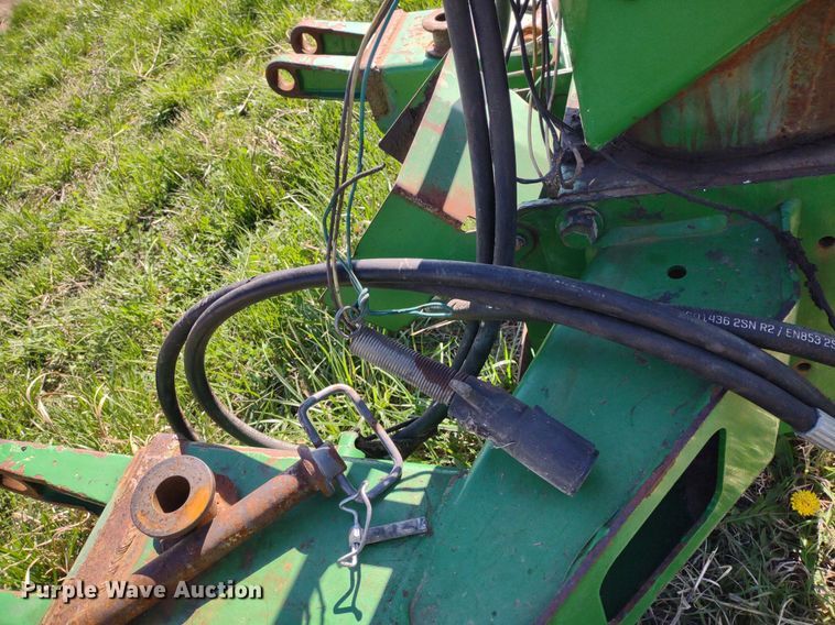 image for item DQ1672 2000 John Deere 945  swather / windrower