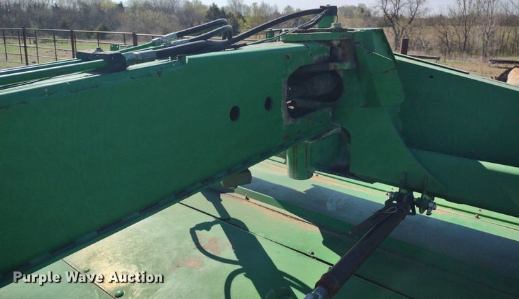 image for item DQ1672 2000 John Deere 945  swather / windrower