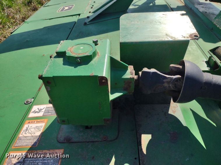 image for item DQ1672 2000 John Deere 945  swather / windrower