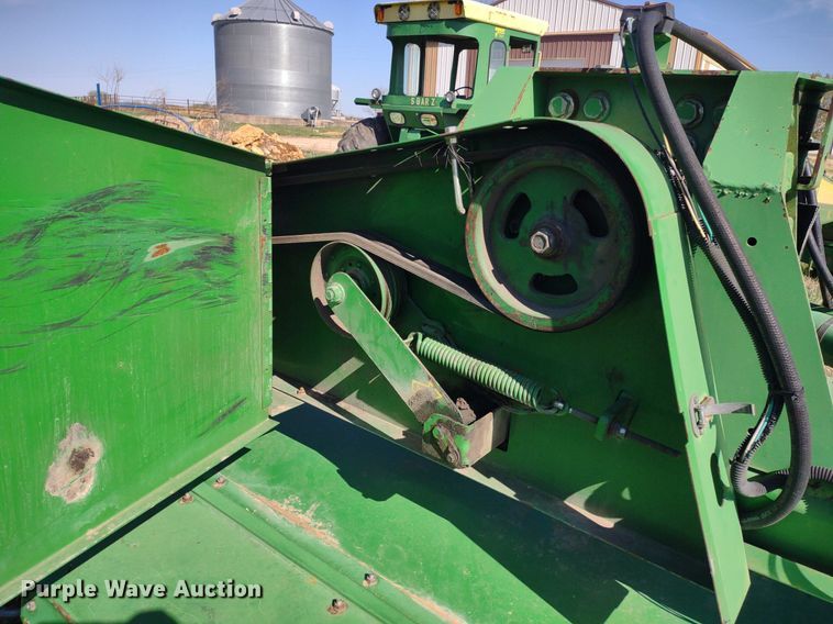 image for item DQ1672 2000 John Deere 945  swather / windrower