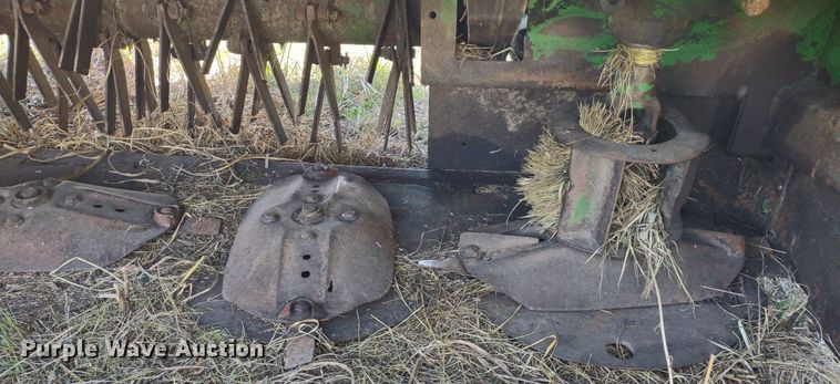 image for item DQ1672 2000 John Deere 945  swather / windrower