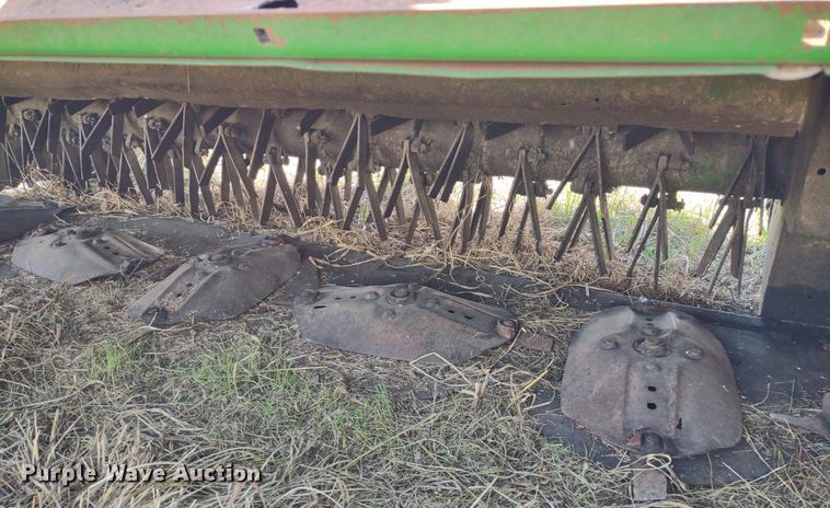 image for item DQ1672 2000 John Deere 945  swather / windrower