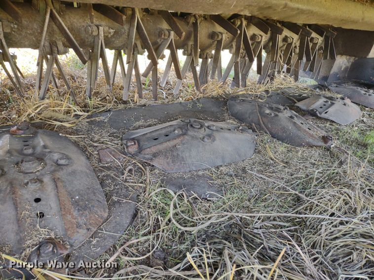 image for item DQ1672 2000 John Deere 945  swather / windrower