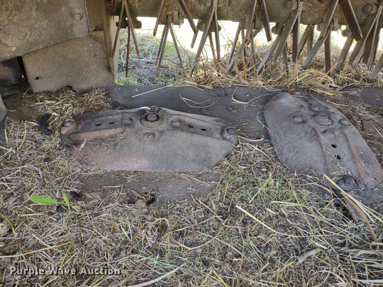 image for item DQ1672 2000 John Deere 945  swather / windrower