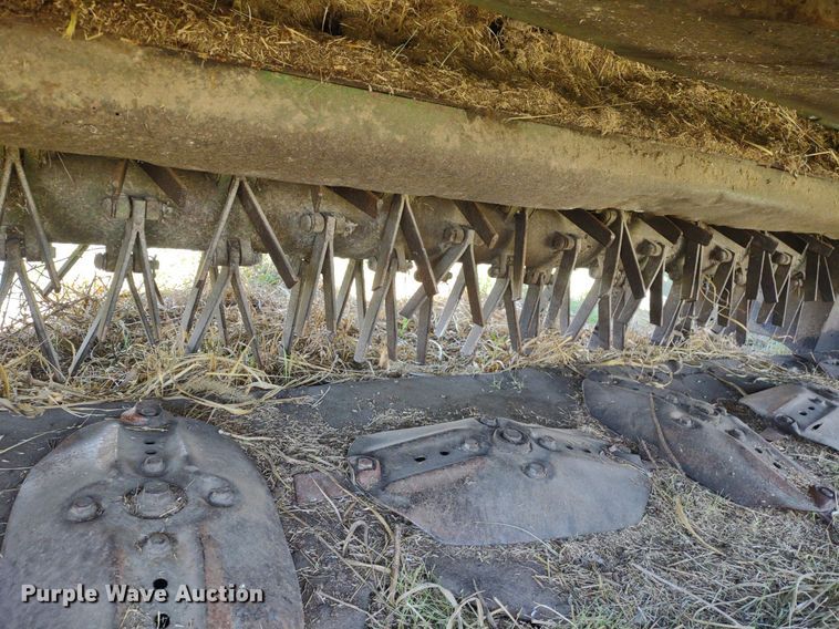 image for item DQ1672 2000 John Deere 945  swather / windrower